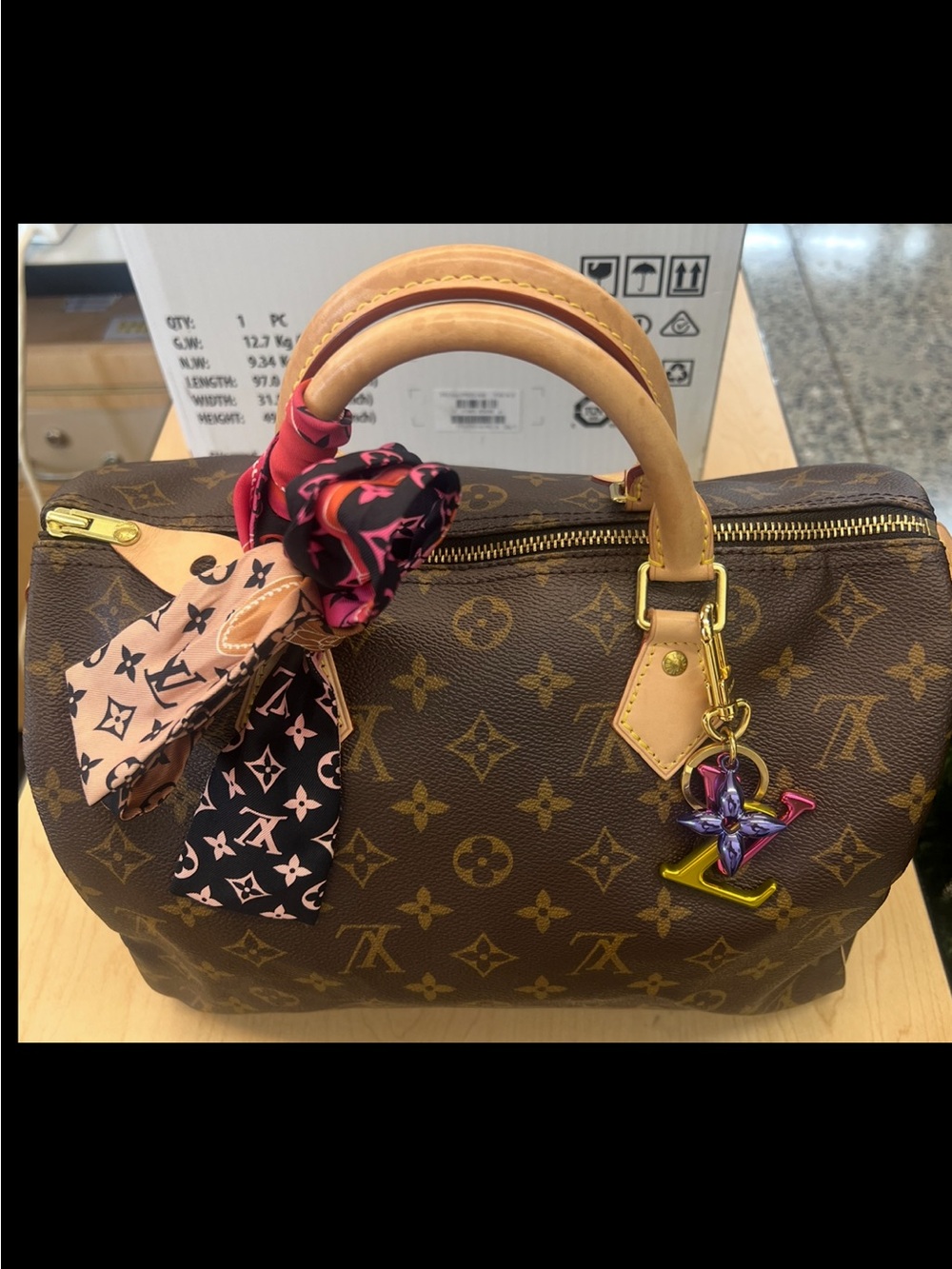 Louis Vuitton Brown Monogram speedy 30 with Pink Scarf and Multicolor Charm.